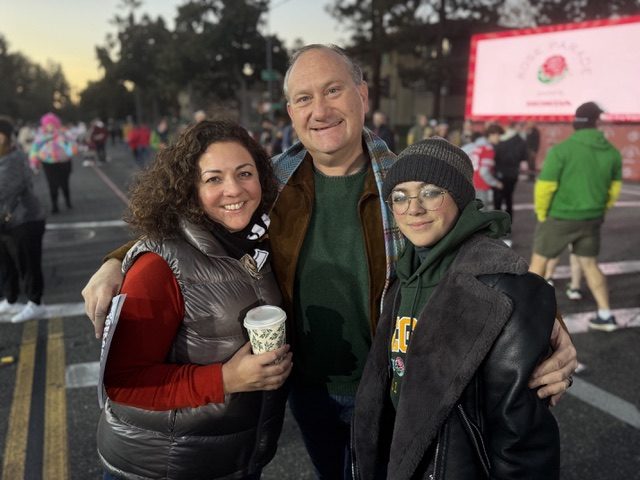 David Coher with family members along the Rose Parade route in Pasadena